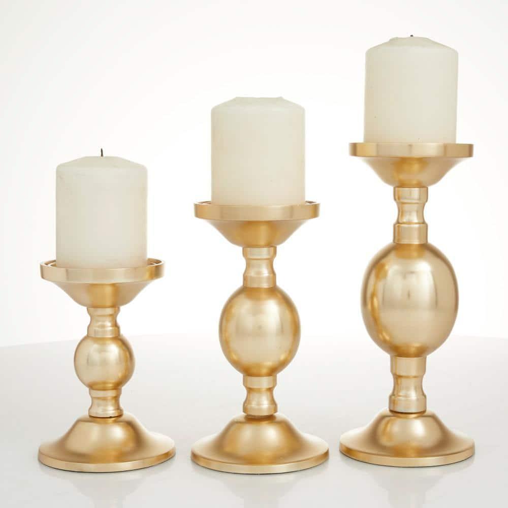Deco 79 Aluminum Metal Decorative Candle Holder Pillar Candle Stand, Set of 3 Candlestick Holder 10", 8", 6"H, Gold