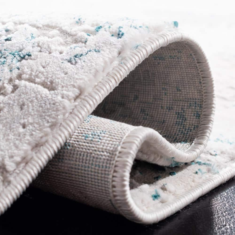 Amalfi AMF572 Power Loomed Area Rug - Cream/Turquoise - 5'3"x7'6" - Safavieh.
