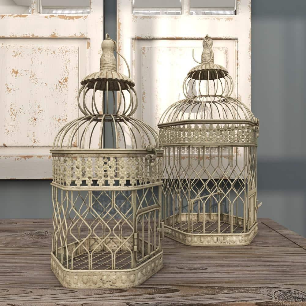 DecMode Cream Vintage Metal Birdcage with Crisscross Vertical Bars and Floral Embossed Design, Set of 2 21", 18"H