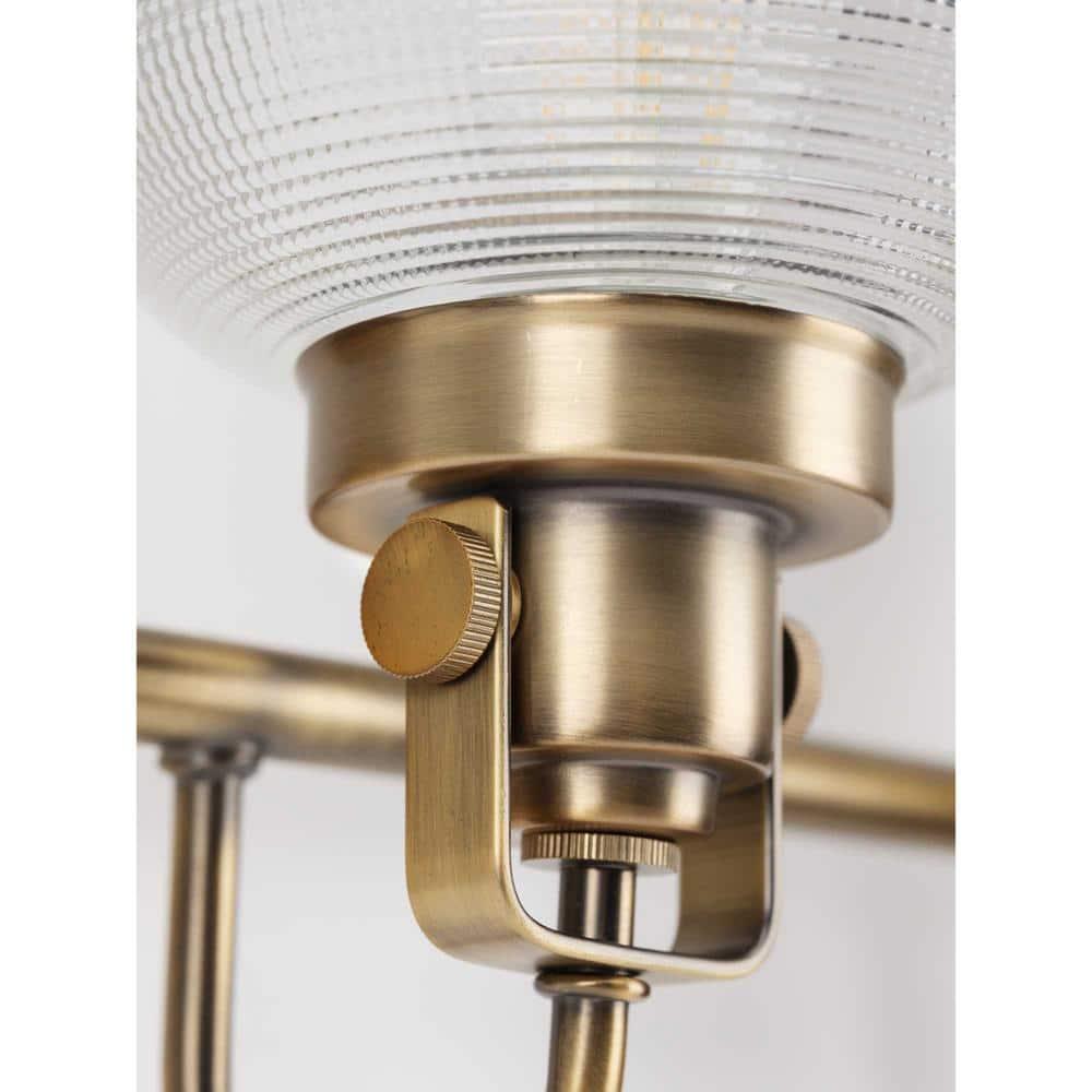 Archie Collection Four-Light Vintage Brass Clear Double Prismatic Glass Coastal Bath Vanity Light