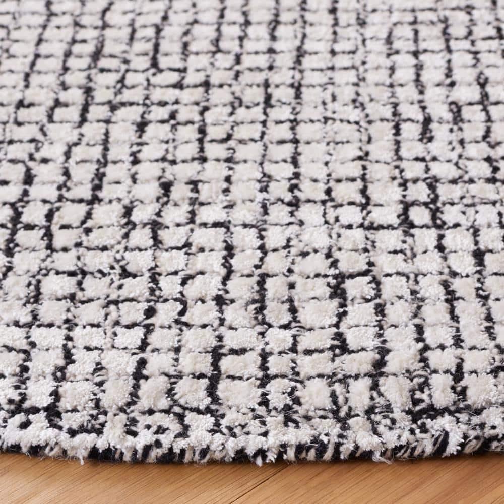 SAFAVIEH Abstract Dalia Geometric Area Rug, Ivory/Black, 4' x 4' Round