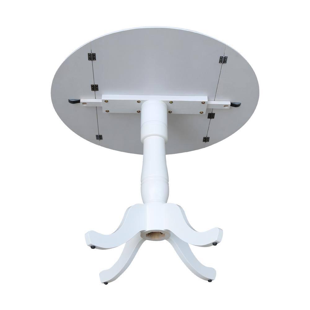 International Concepts 42 In Round dual drop Leaf Pedestal Table - 35.5  inchesH