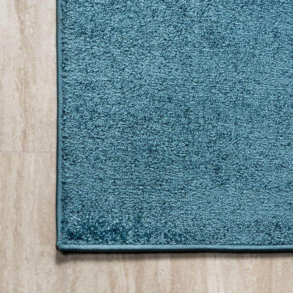 8'x10' Haze Solid Low-Pile Area Rug, Turquoise - JONATHAN Y