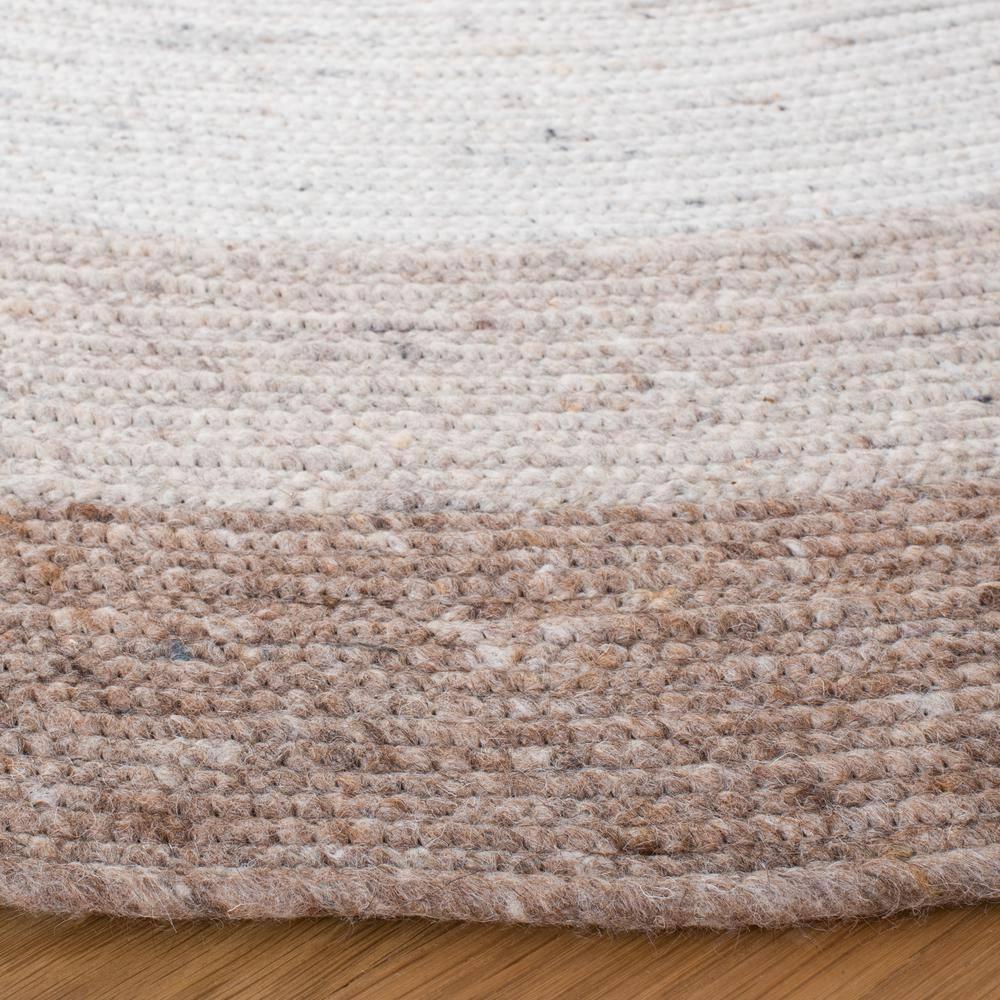 Handmade Ivory Wool Braided Round Rug - 4' Diameter