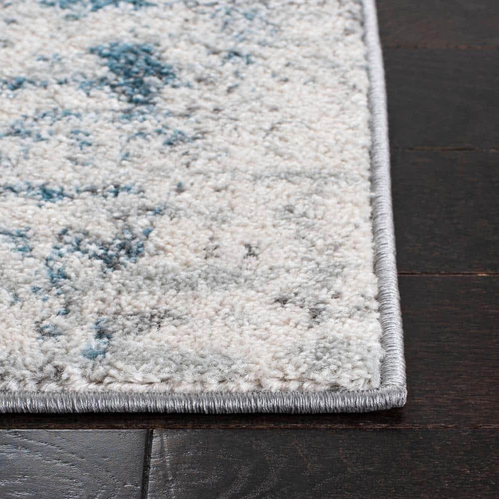 SAFAVIEH Tulum Kelsang Abstract Area Rug, 9' x 12', Ivory/Blue