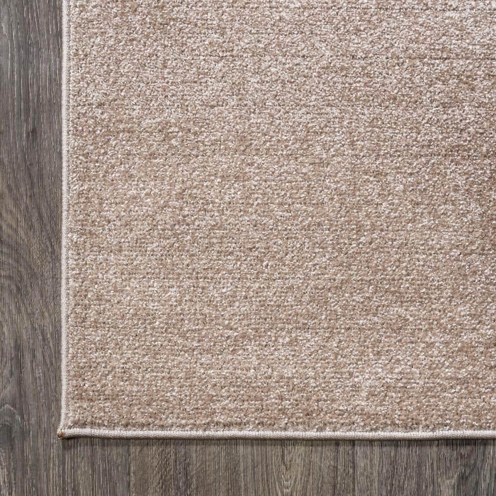 8'x10' Haze Solid Low-Pile Area Rug, Beige - JONATHAN Y