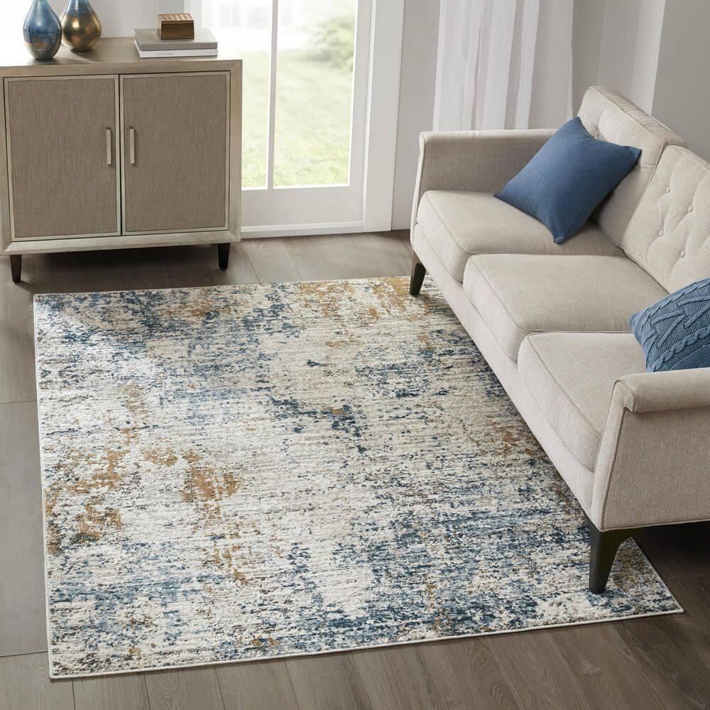 Amelia Cream/Blue 5 ft. x 7 ft. Pegasus Abstract Area Rug