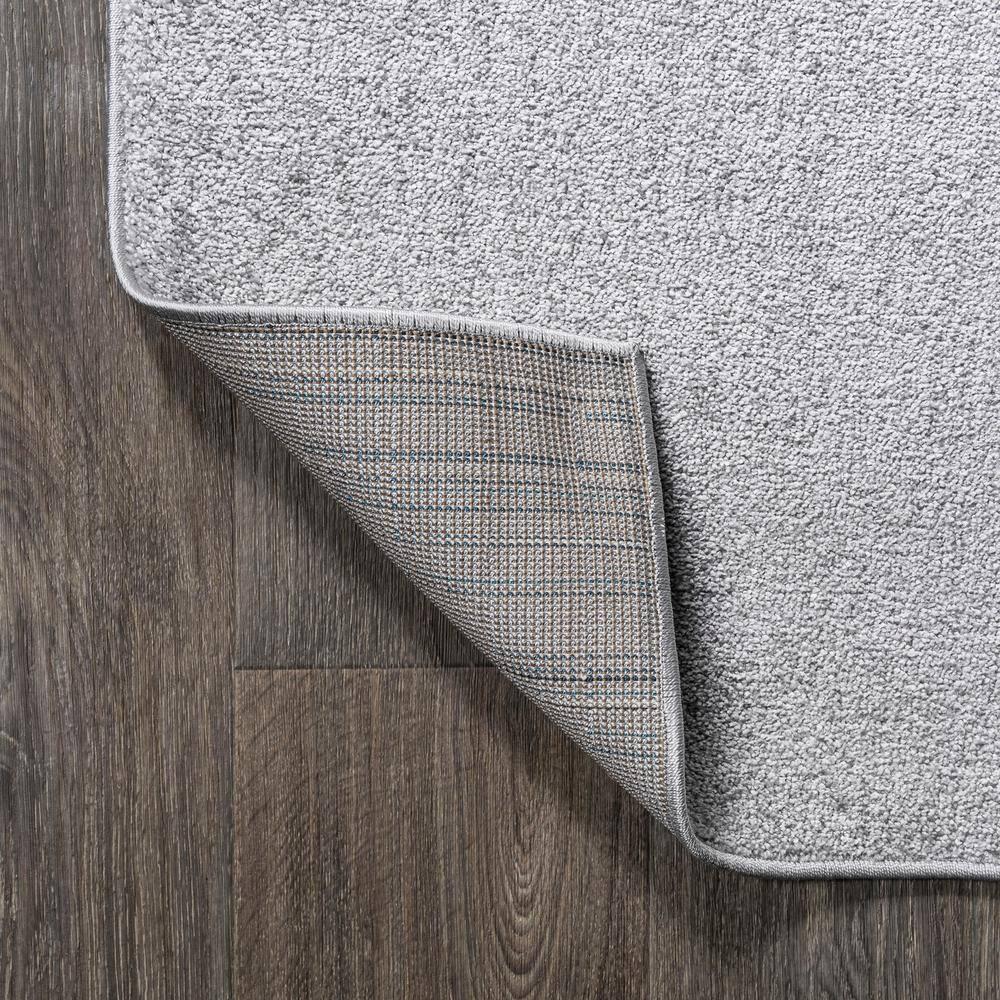 5'x8' Haze Solid Low-Pile Area Rug, Light Gray - JONATHAN Y