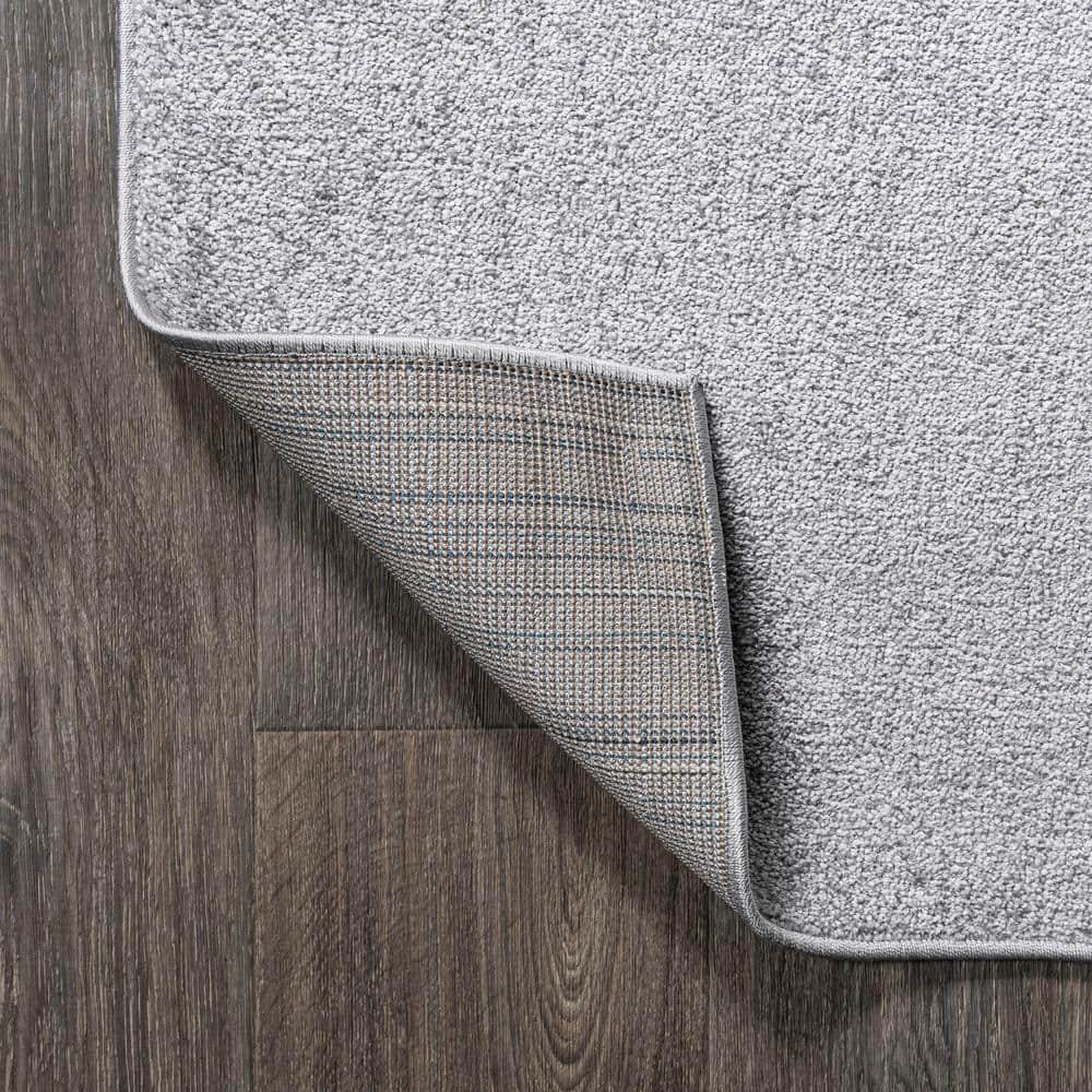 8'x10' Haze Solid Low-Pile Area Rug, Light Gray - JONATHAN Y