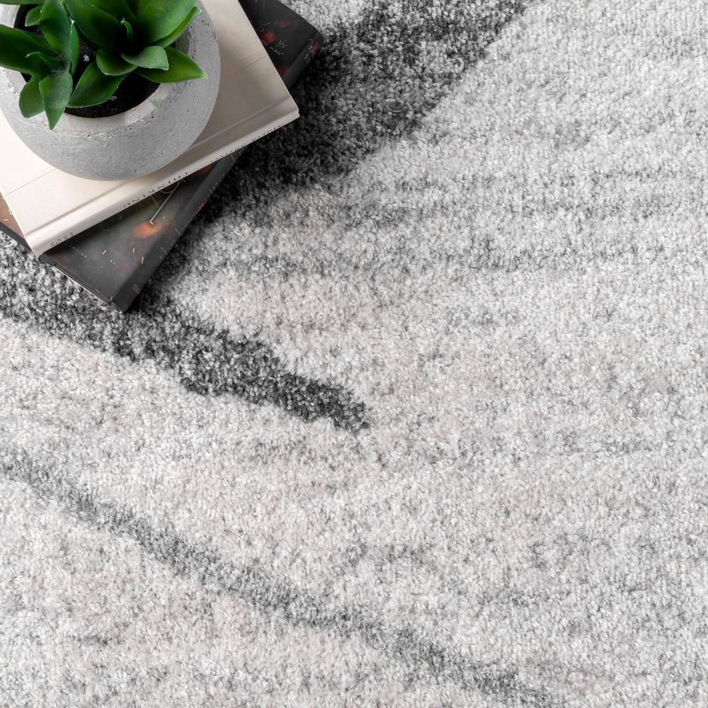 Gray Oval Reversible Stain-Resistant Synthetic Area Rug