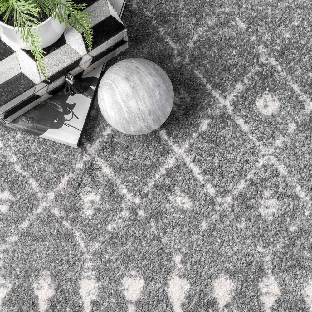 Handmade Dark Grey Geometric Oval 5' x 7' Synthetic Rug
