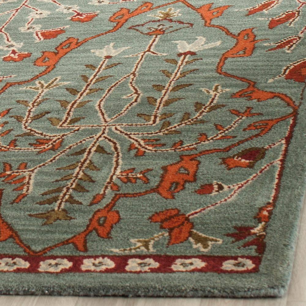 Wyndham WYD206 Power Loomed Area Rug - Blue/Rust - 8'9"x12' - Safavieh.