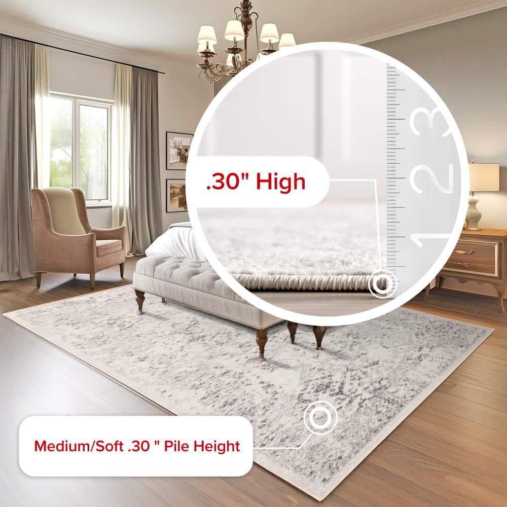 nuLOOM Odell Faded Vintage Ivory 6' 7" x 9' Vintage Area Rug