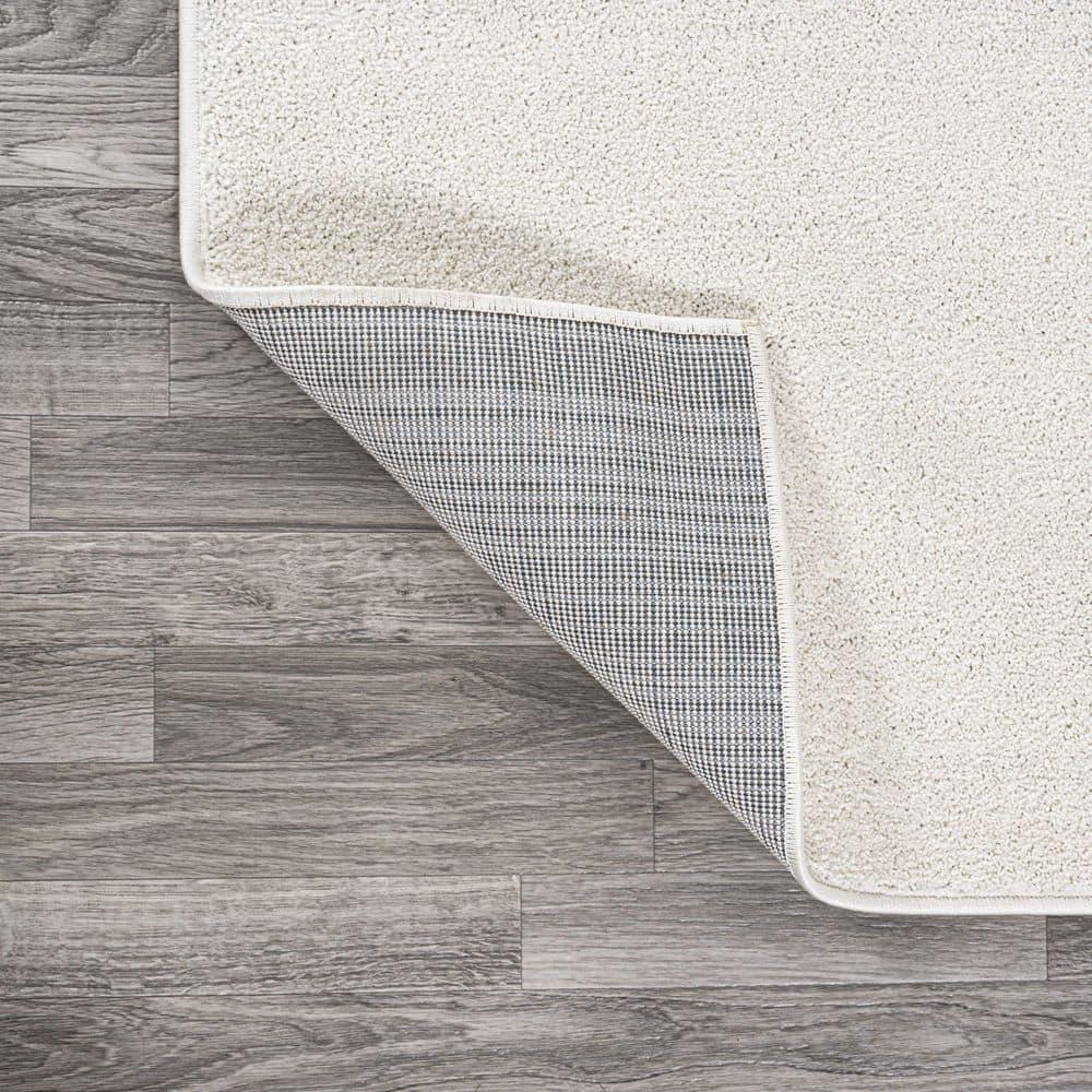 8'x10' Haze Solid Low-Pile, Cream - JONATHAN Y