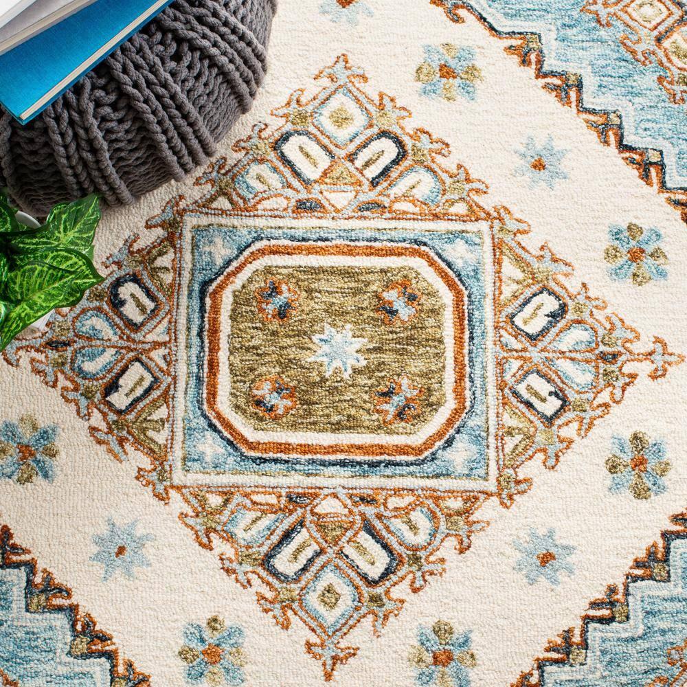 Capri CPR209 Hand Tufted Area Rug - Ivory/Rust - 7'x7' - Safavieh.