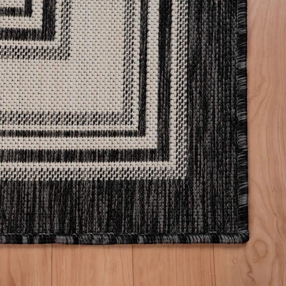 LR Home Kiara 7'6" x 9'5" Black/Gray/White Bordered Fade & Stain Resistant Indoor/Outdoor Area Rug