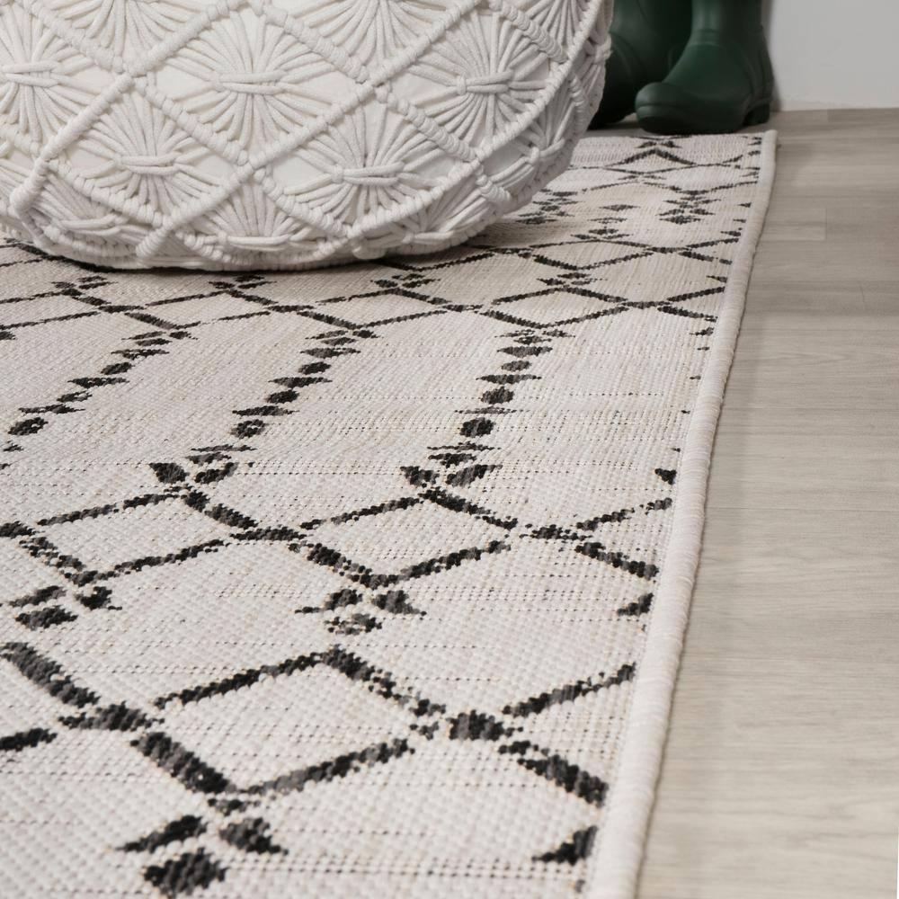 5' Round Ourika Moroccan Geometric Textured Weave Indoor/Outdoor Area Rug, Cream/Black - JONATHAN Y