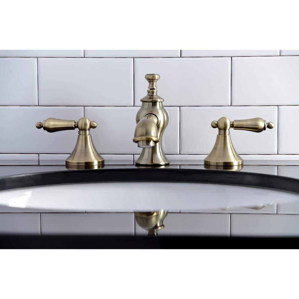 Kingston Brass Vintage Two-Handle 3-Hole Deck Mount Widespread Bathroom Faucet with Brass Pop-Up Drain