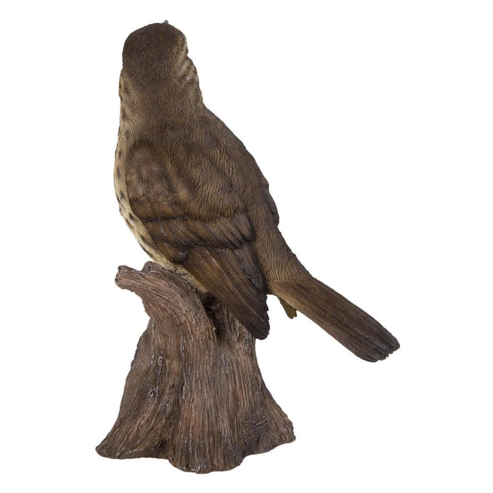 Songbird Standing on Stump Statue
