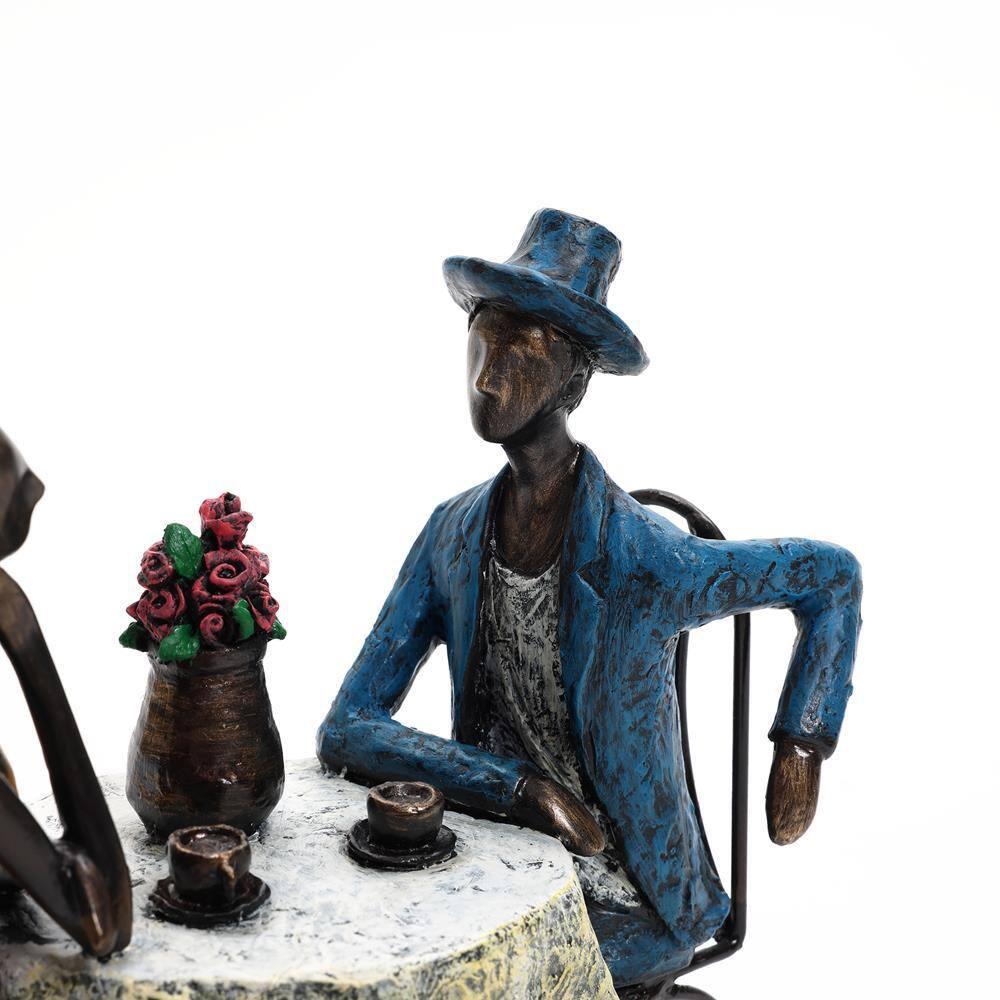 LuxenHome 9.4" LuxenHome Modern Brown Polyresin Couple Date Night Tabletop Home Decor Multicolored