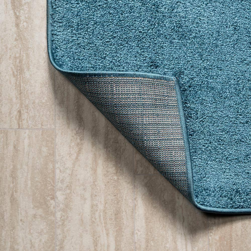 8'x10' Haze Solid Low-Pile Area Rug, Turquoise - JONATHAN Y