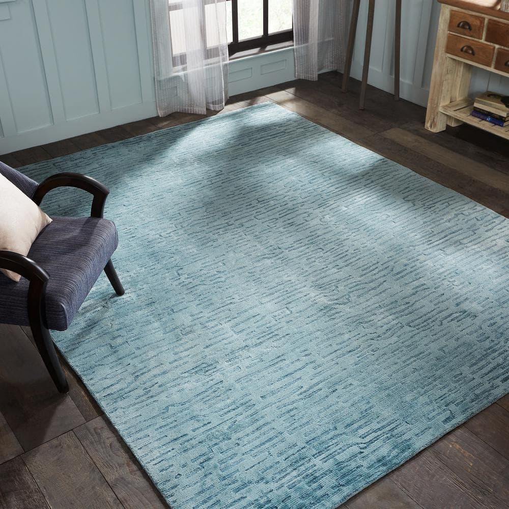 Kozeroff Blue Area Rug
