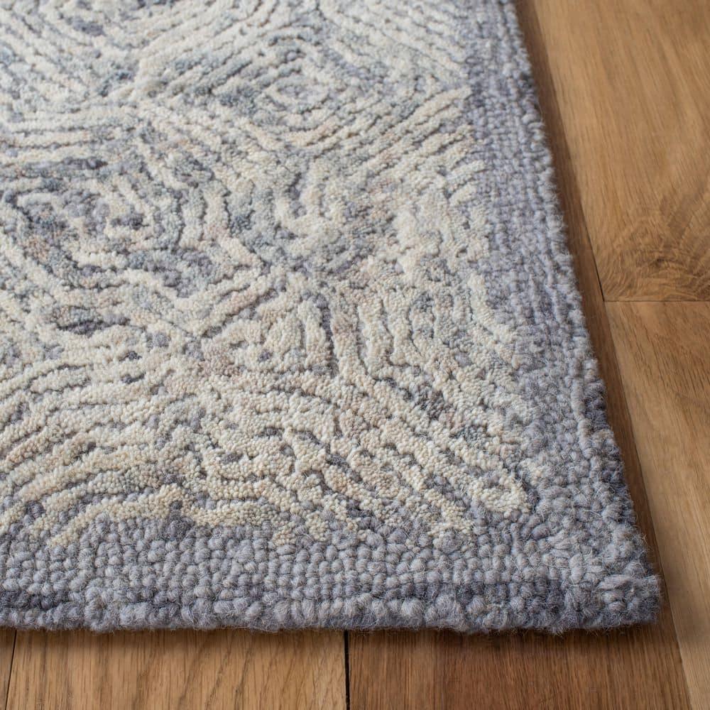 Ikat IKT506 Hand Tufted Area Rug - Silver - 9'x12' - Safavieh