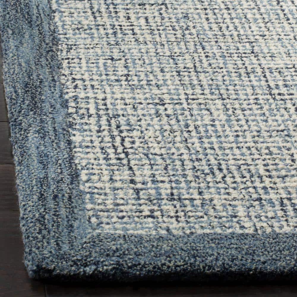 SAFAVIEH Abstract Clive Bordered Wool Area Rug, Navy/Ivory, 5' x 8'