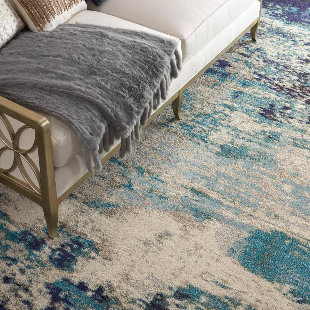 Nourison Celestial CES02 Indoor only Area Rug - Ivory/Teal Blue 9' x 12'