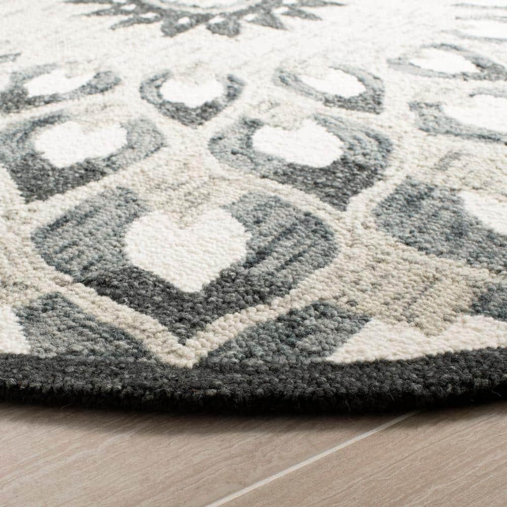 Novelty NOV603 Hand Tufted Area Rug - Charcoal/Ivory - 9' round - Safavieh.