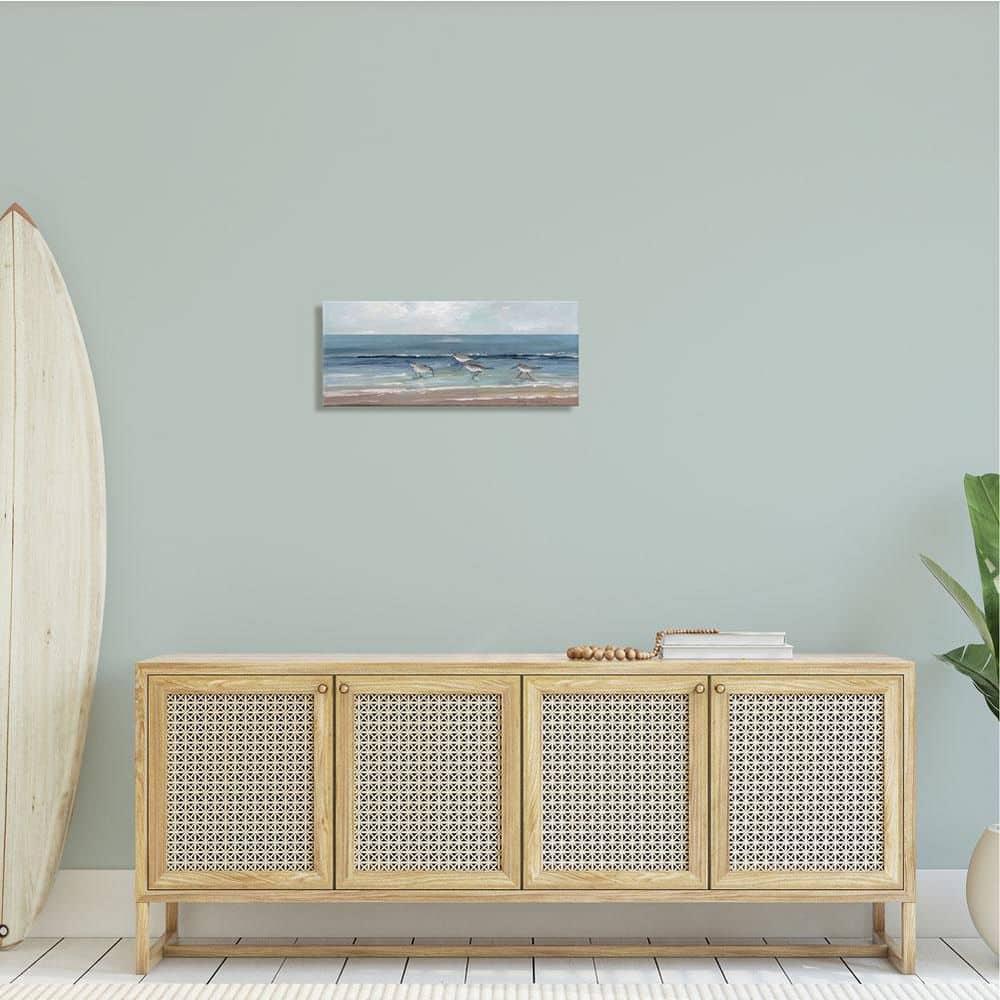 Stupell Industries Sandpipers Birds Cloudy Sky Beach Shore Painting, 24 x 10, Design by Sally Swatland