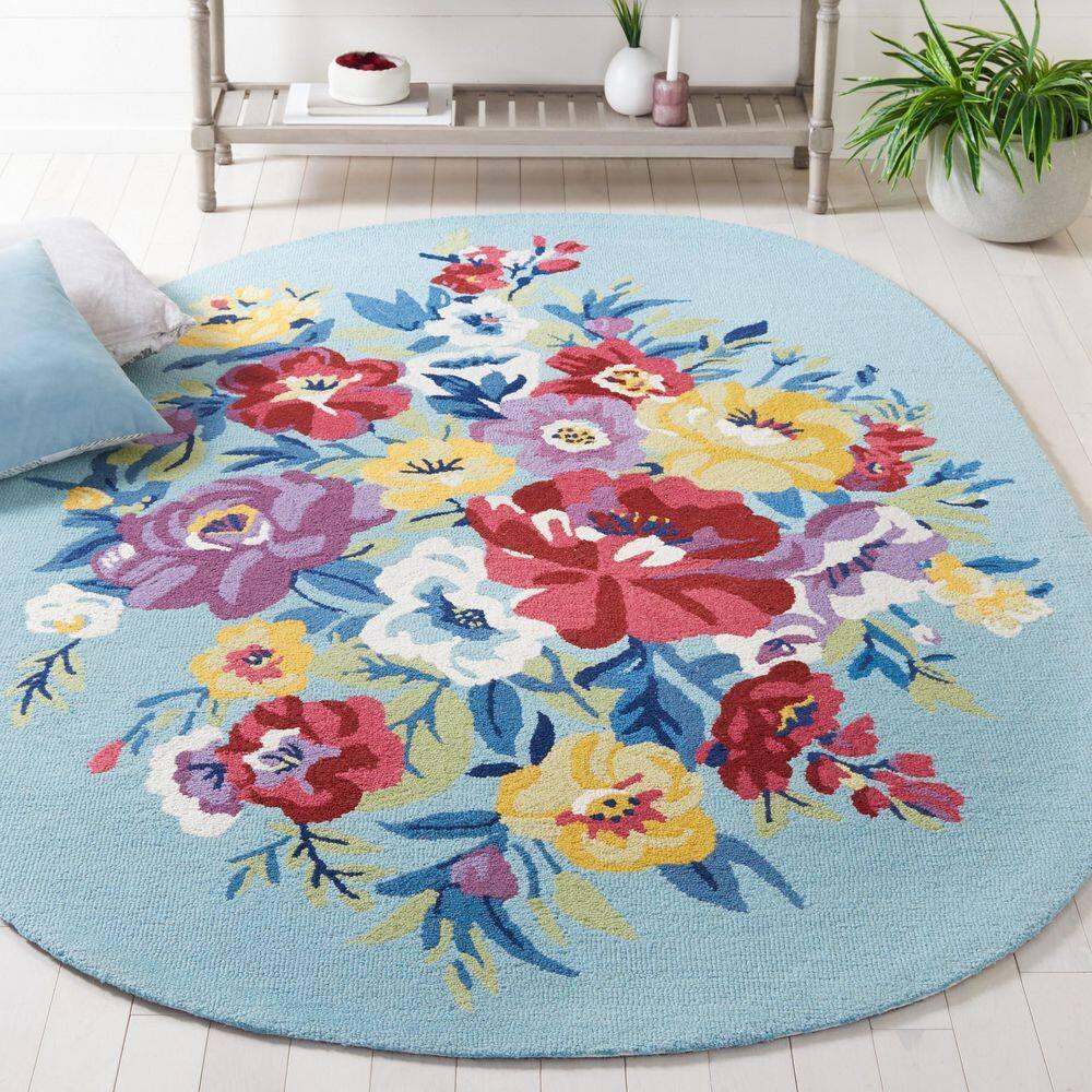 Chelsea HK219 Hand Tufted Area Rug - Blue/Rose - 6'x9' Oval - Safavieh.