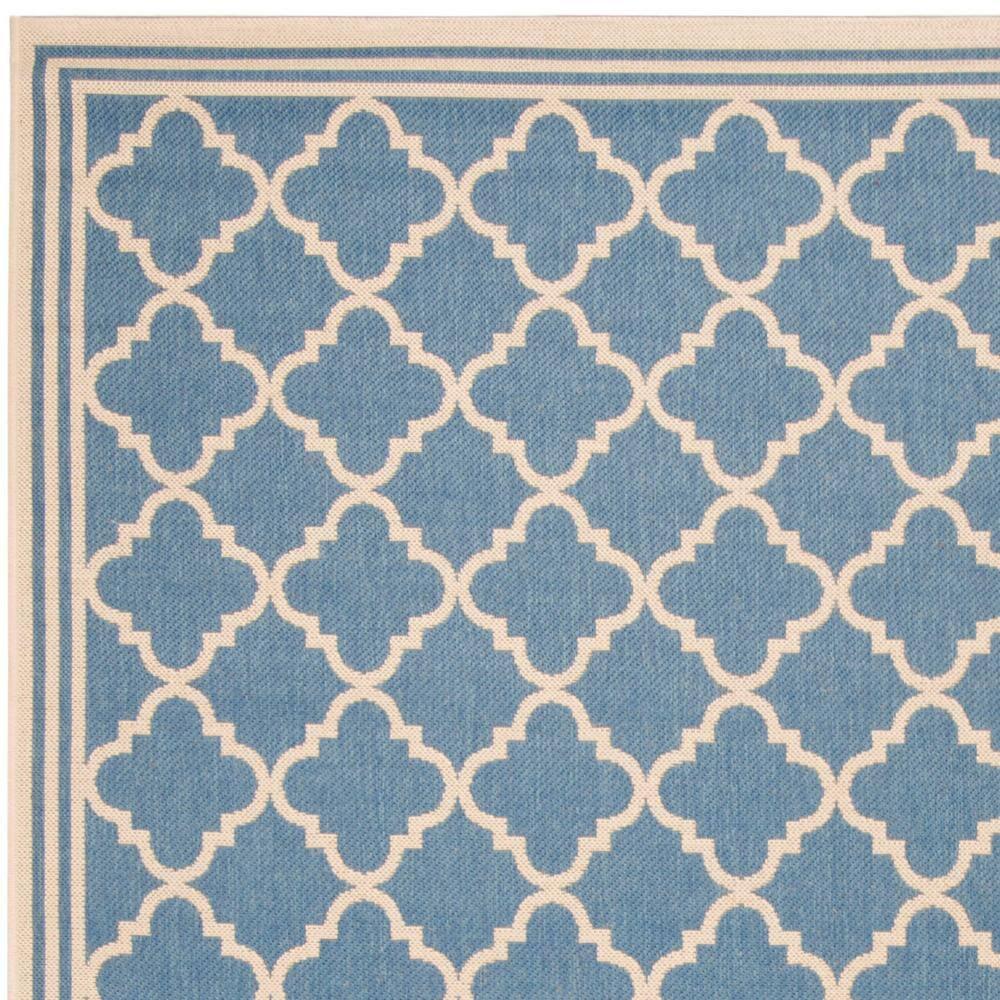 Blue and Cream Geometric 9' x 12' Synthetic Area Rug