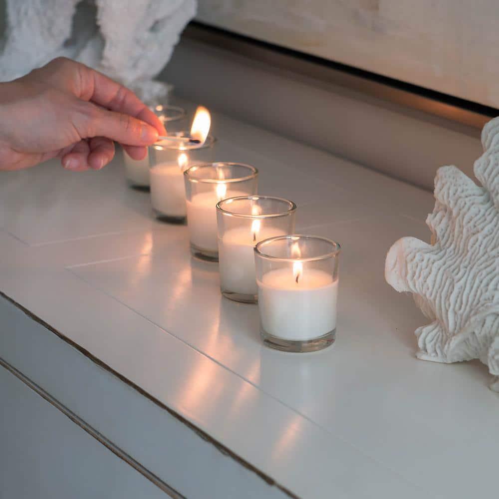 The Party Aisle™ Stonebriar Unscented Votive Candle with Glass Holder (Set of 48)