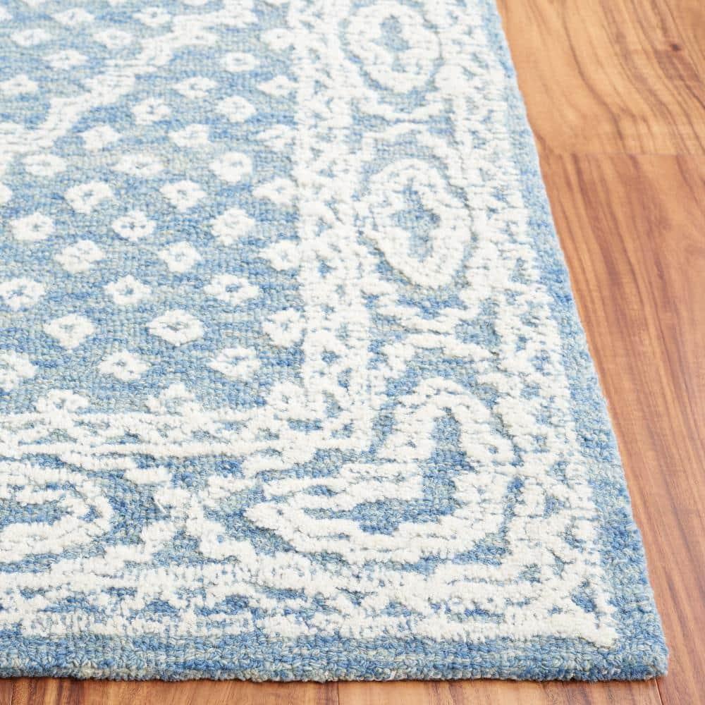 Ebony EBN306 Hand Tufted Indoor Area Rug - Ivory/Navy - 6'x9' - Safavieh