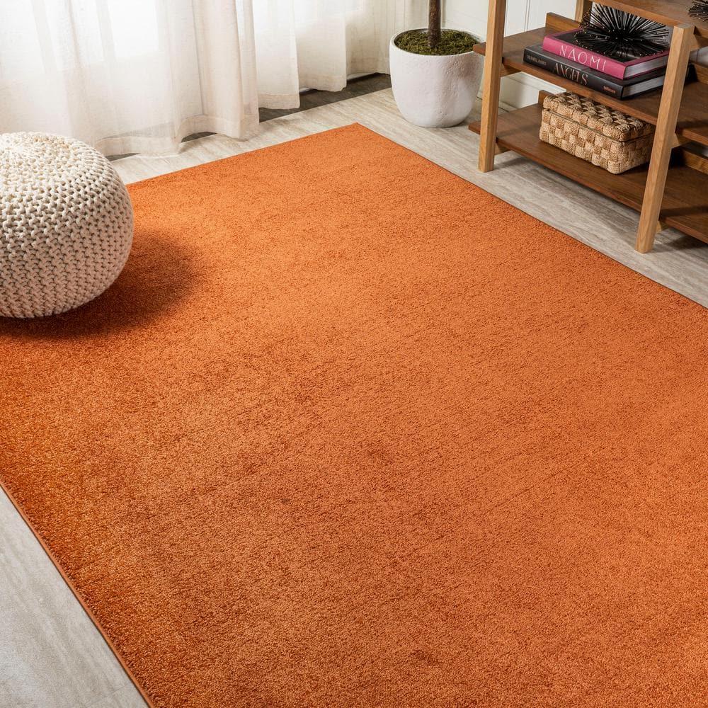 8'x10' Haze Solid Low-Pile Area Rug, Orange - JONATHAN Y