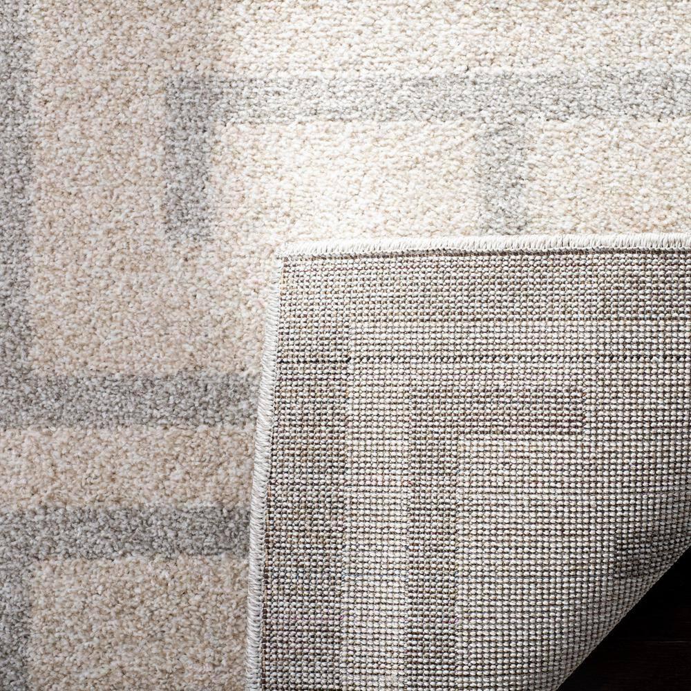 Ivory and Light Gray Rectangular 9' x 12' Synthetic Rug