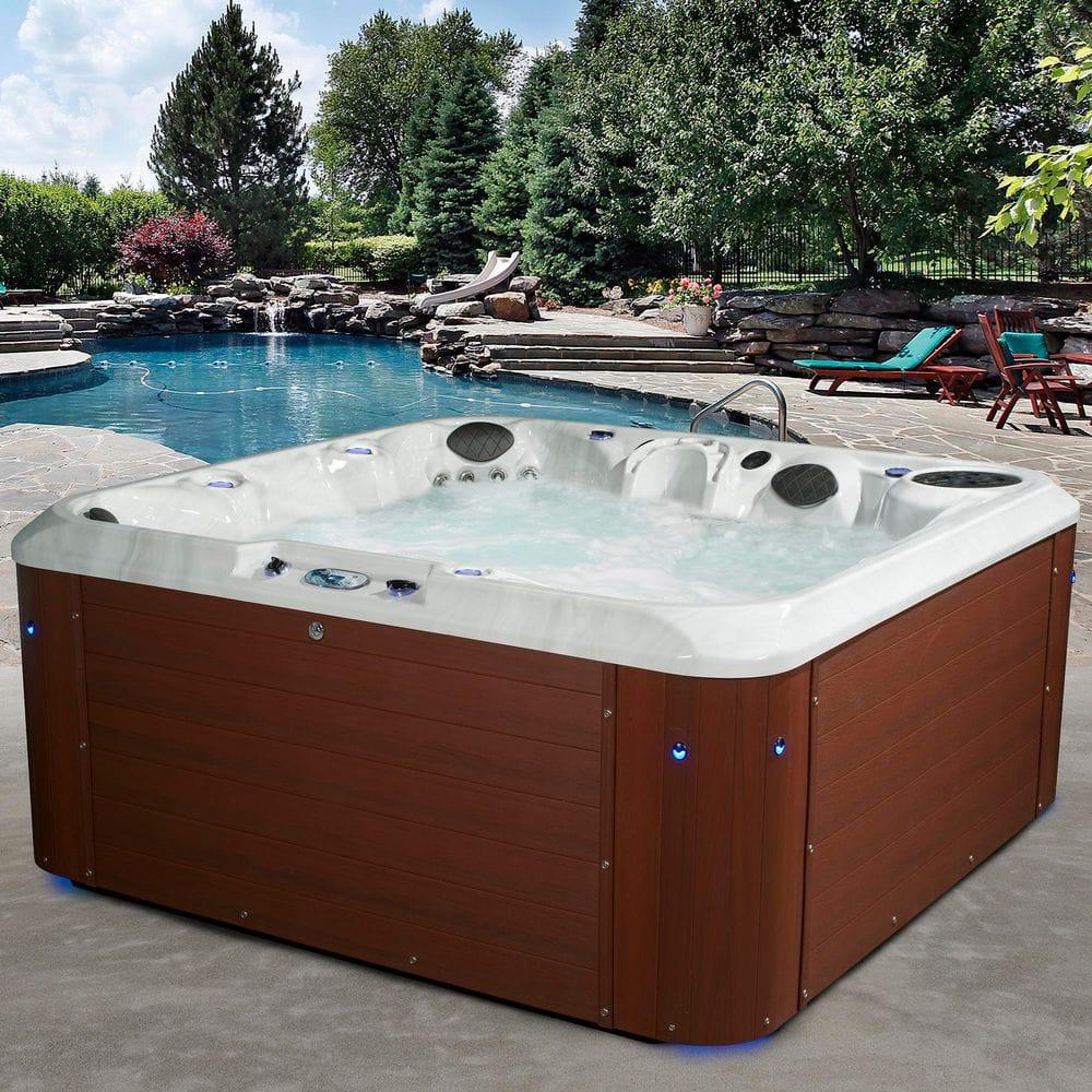 Amplified 6-Person 100-Jet Double-Lounger Hot Tub Spa with Bluetooth Stereo, 3 Pumps, LED Lighting, Stainless Steel Heater and Ozonator, Insulated Cover and Steps Included