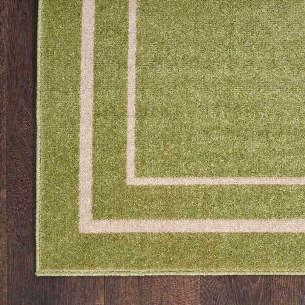 Nourison Essentials Solid Bordered Low Pile Indoor Outdoor Area Rug 4' x 6' Green Ivory