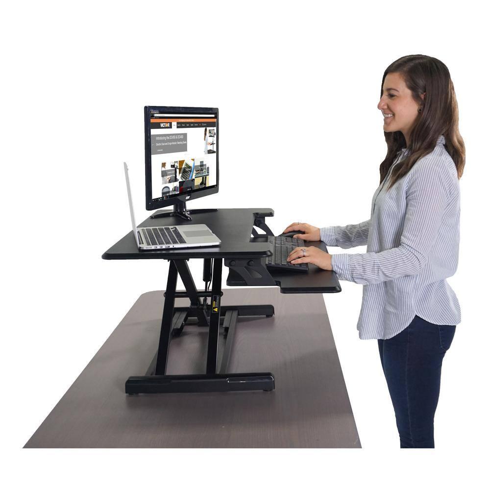 Victor DCX610 Height Adjustable Compact Standing Desk| Black| 33” Wide Sit-Stand Dual Monitor Desk and Laptop Riser Workstation| Compatible with Most Monitor Arms
