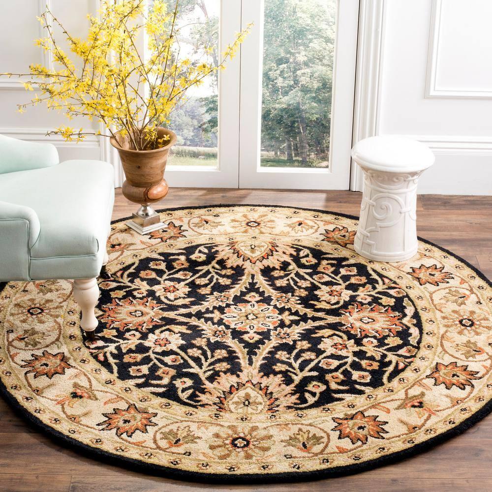 Antiquity AT249 Hand Tufted Area Rug - Black - 8' round - Safavieh.