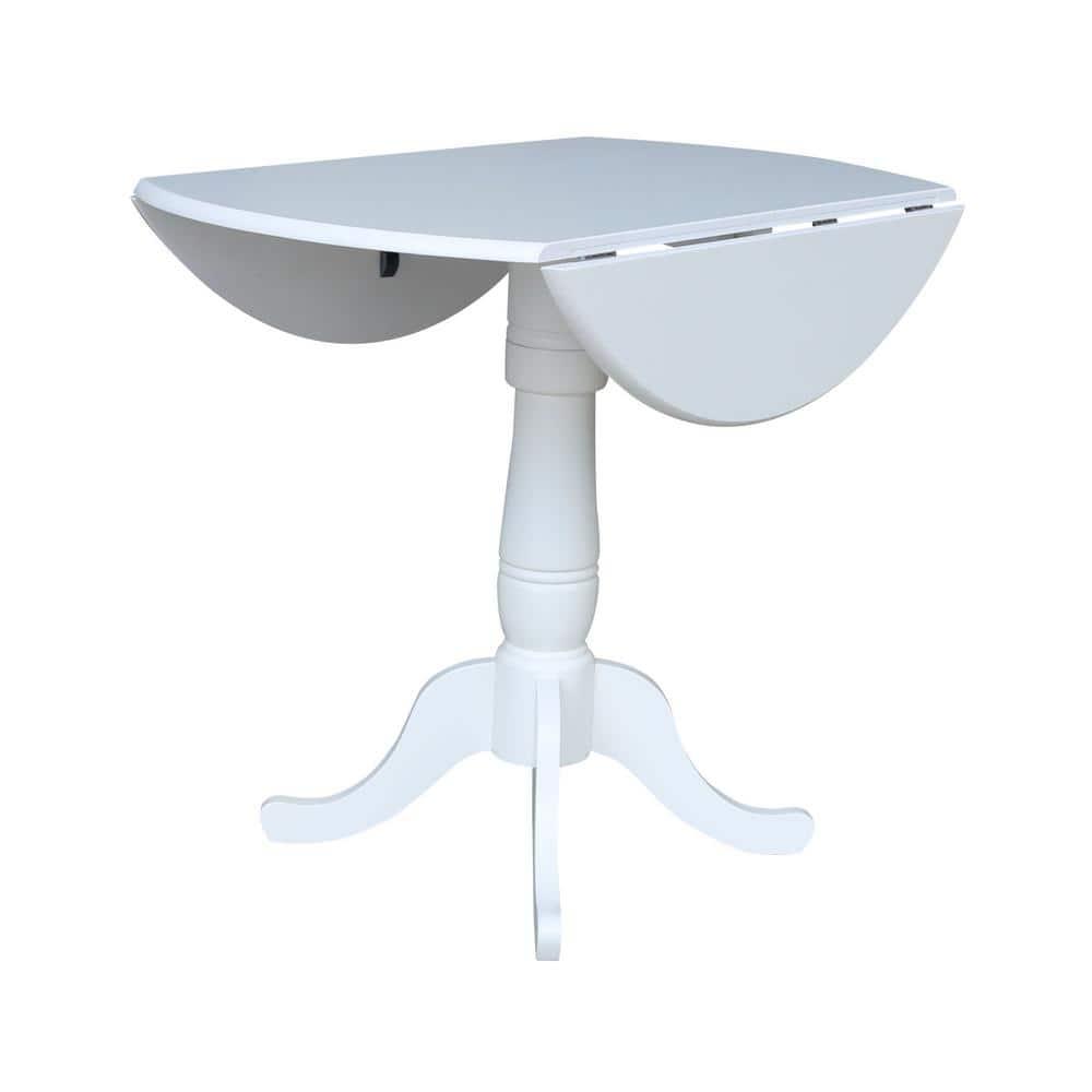 International Concepts 42 In Round dual drop Leaf Pedestal Table - 35.5  inchesH