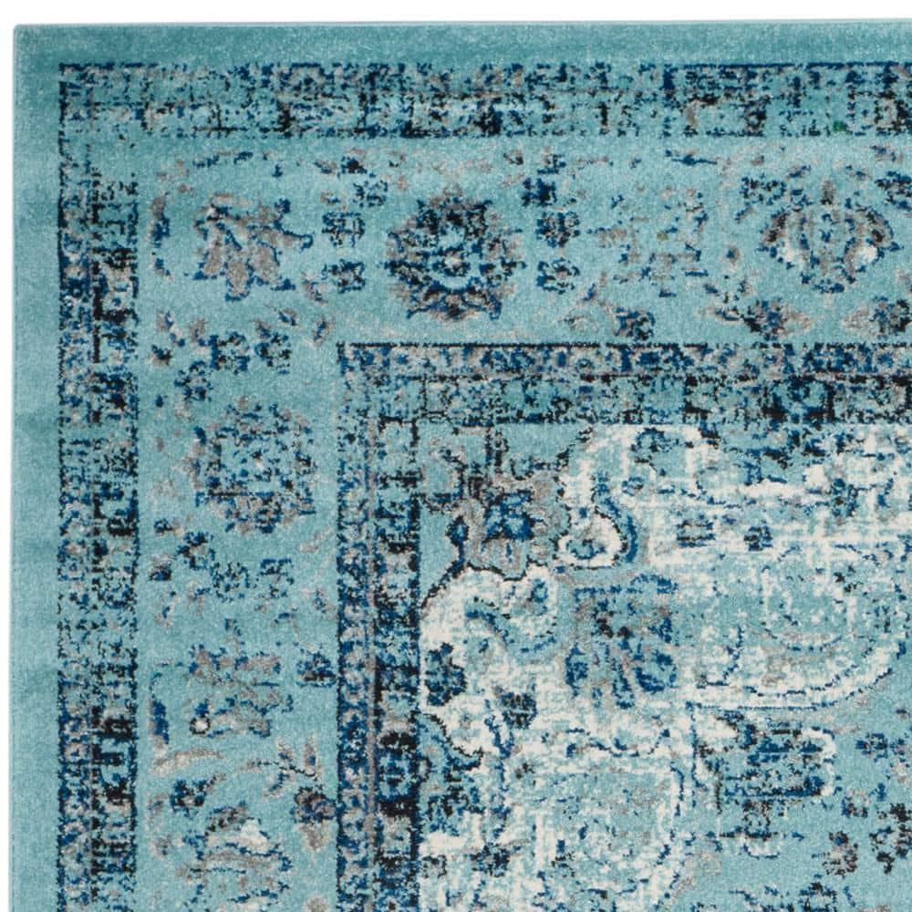 SAFAVIEH Evoke Teale Traditional Bordered Area Rug, Light Blue, 9' x 12'