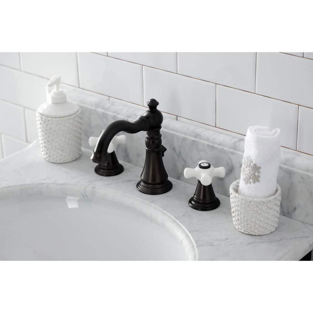 Kingston Brass American Classic Two-Handle 3-Hole Deck Mount Widespread Bathroom Faucet with Pop-Up Drain