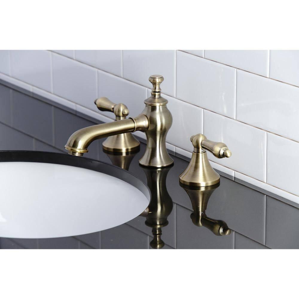 Kingston Brass Vintage Two-Handle 3-Hole Deck Mount Widespread Bathroom Faucet with Brass Pop-Up Drain
