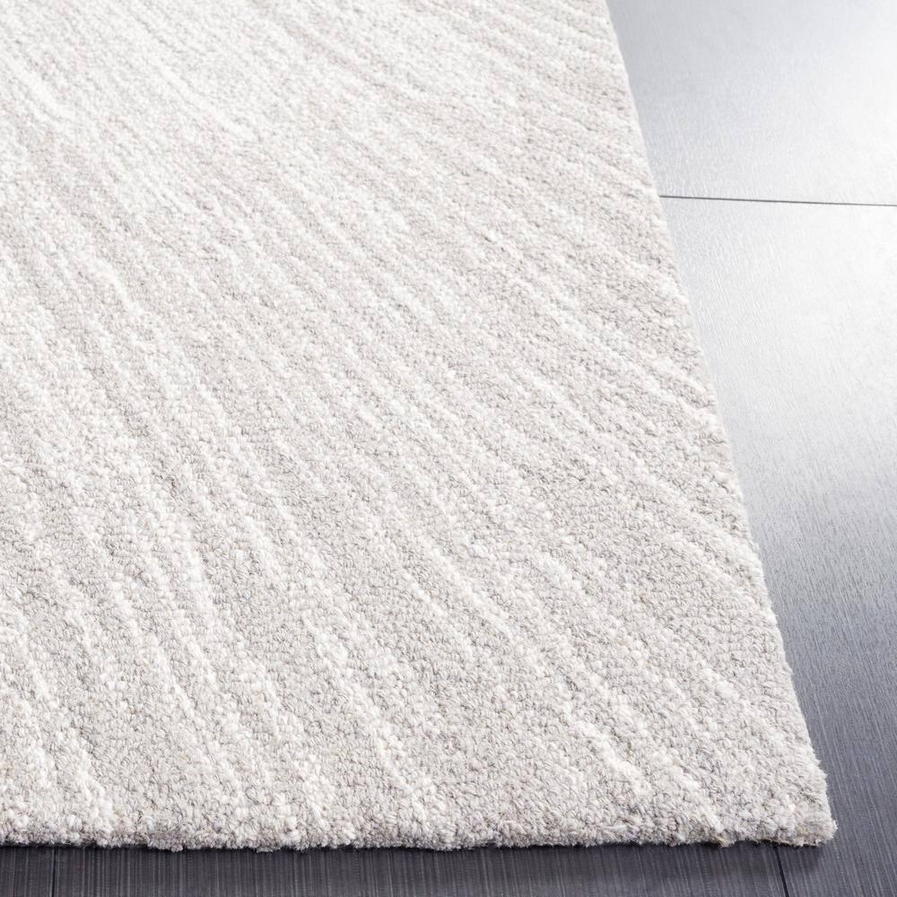 SAFAVIEH Abstract Olivera Radiate Area Rug, Ivory/Silver, 4' x 6'