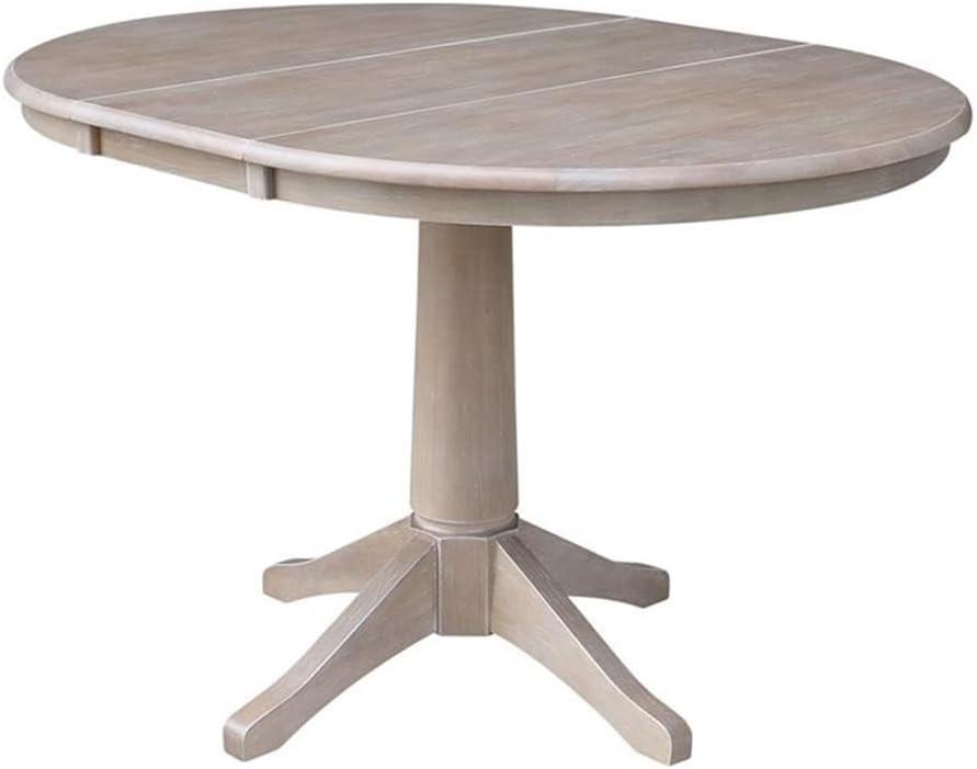36" Magnolia Round Top Dining Table with 12" Leaf Washed Gray Taupe - International Concepts: Hardwood Pedestal Base, Seats 4