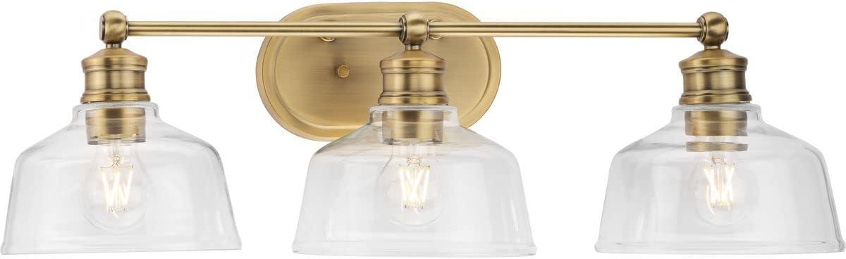 Progress Lighting Singleton 3-Light Vanity Fixture, Vintage Brass, Clear Glass Shades, Steel Material, Damp Rated