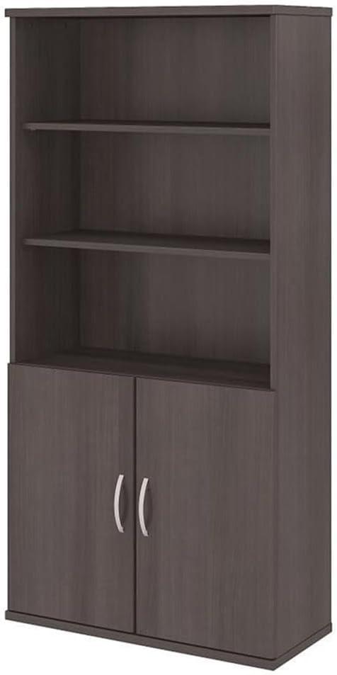 Studio C 5 Shelf Bookcase with Doors in Storm Gray - Engineered Wood