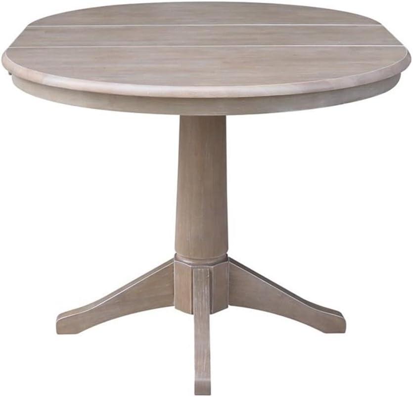 36" Magnolia Round Top Dining Table with 12" Leaf Washed Gray Taupe - International Concepts: Hardwood Pedestal Base, Seats 4